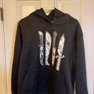 Horror Movie Characters in Knives Black Hoodie